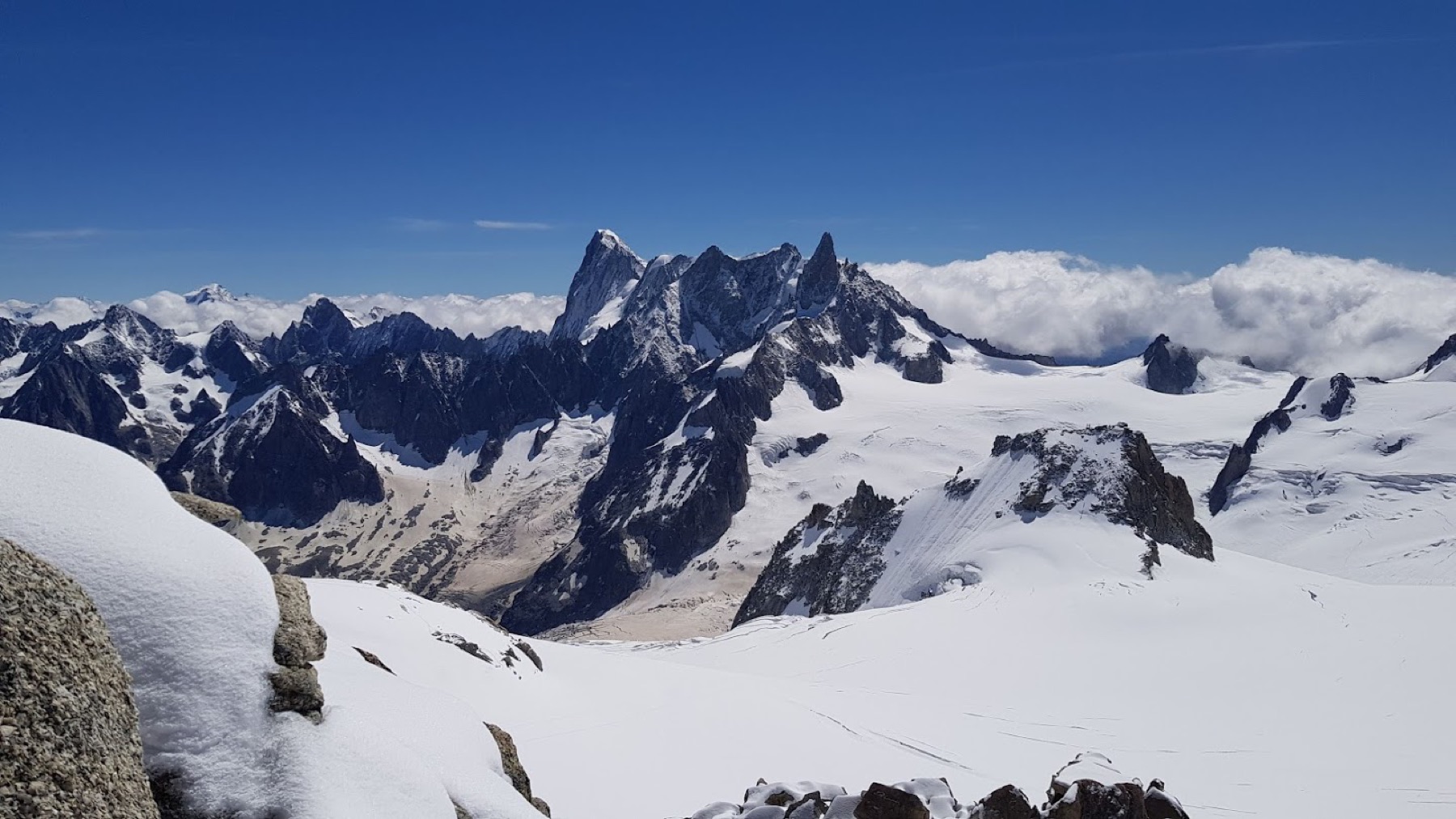 Jagged snowy ridges above a glacier